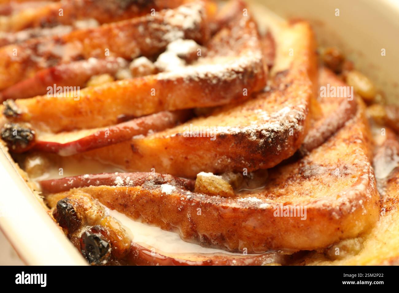Freshly baked bread pudding in baking dish, closeup Stock Photo
