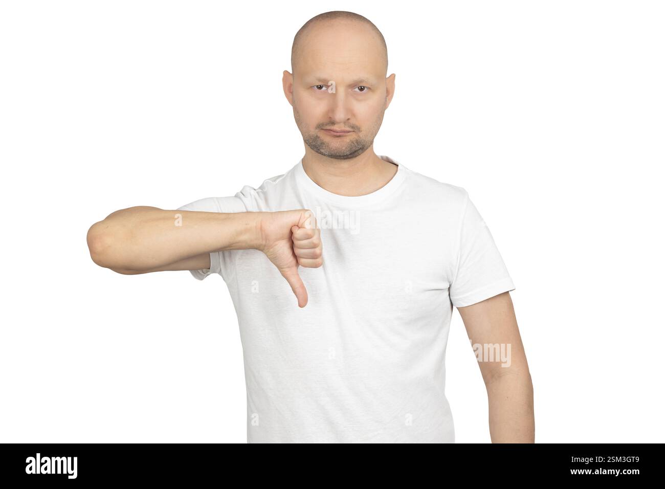 A Caucasian bald man in a white t-shirt makes a thumbs-down gesture ...