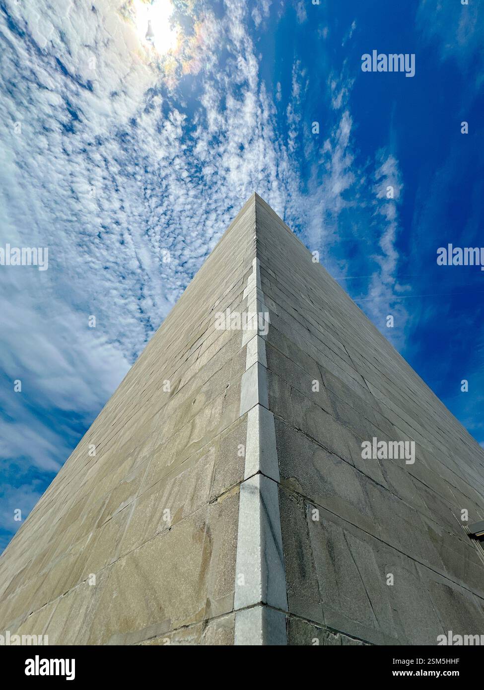 Washington DC, USA - 30 May 2024: Low angle close up view looking up the Washington Monument in Washington DC with a dramatic blue sky - Smartphone Captured Stock Image