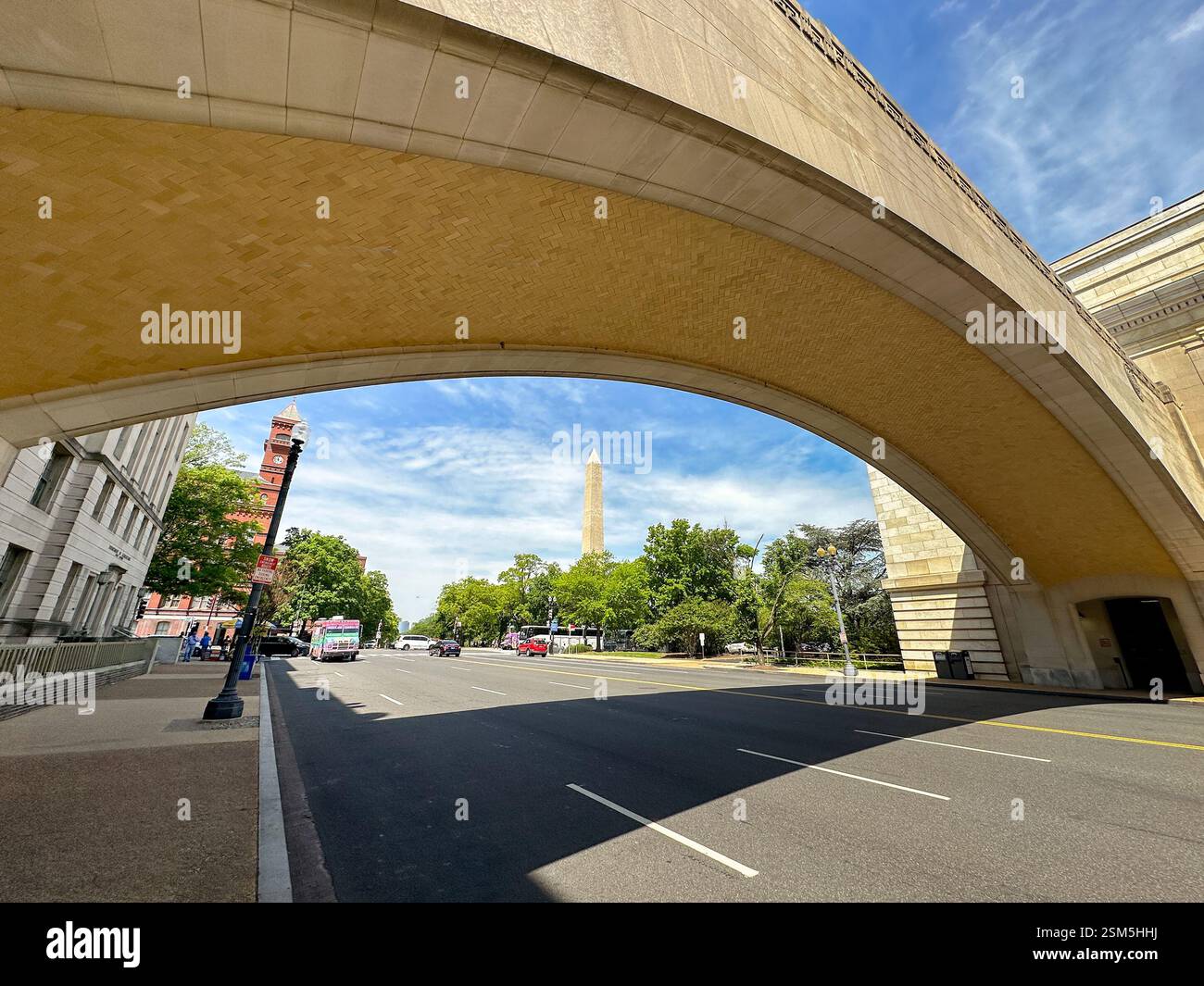 Washington DC, USA - 30 May 2024: Scenic landscape view of the Washington Monument viewed through the Wilson Memorial Arch on Independence Avenue - Smartphone Captured Stock Image