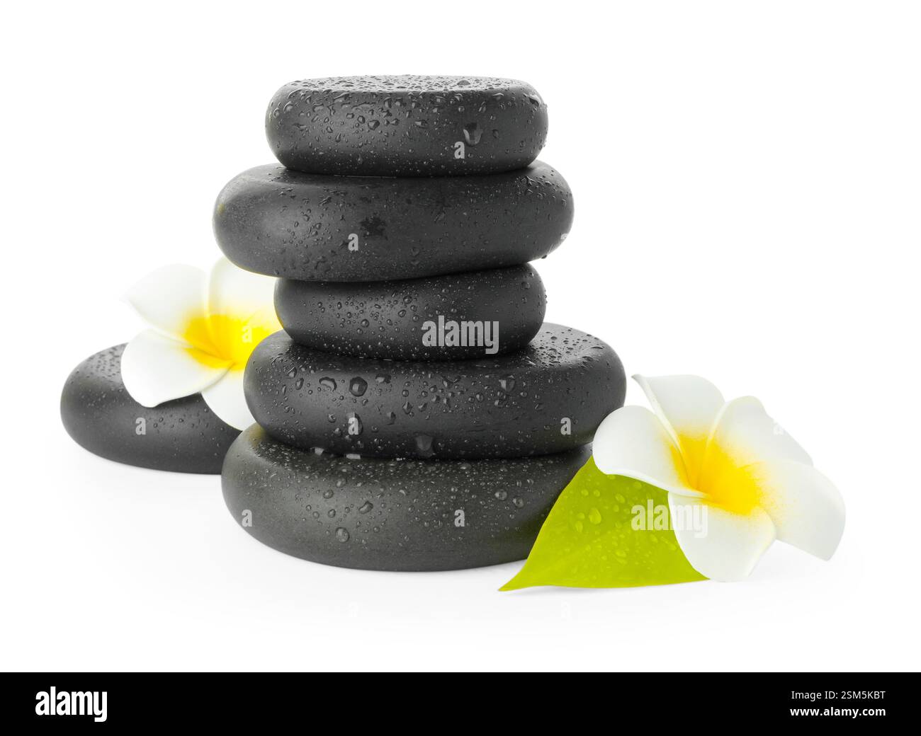 Wet spa stones with flowers and leaf isolated on white Stock Photo - Alamy