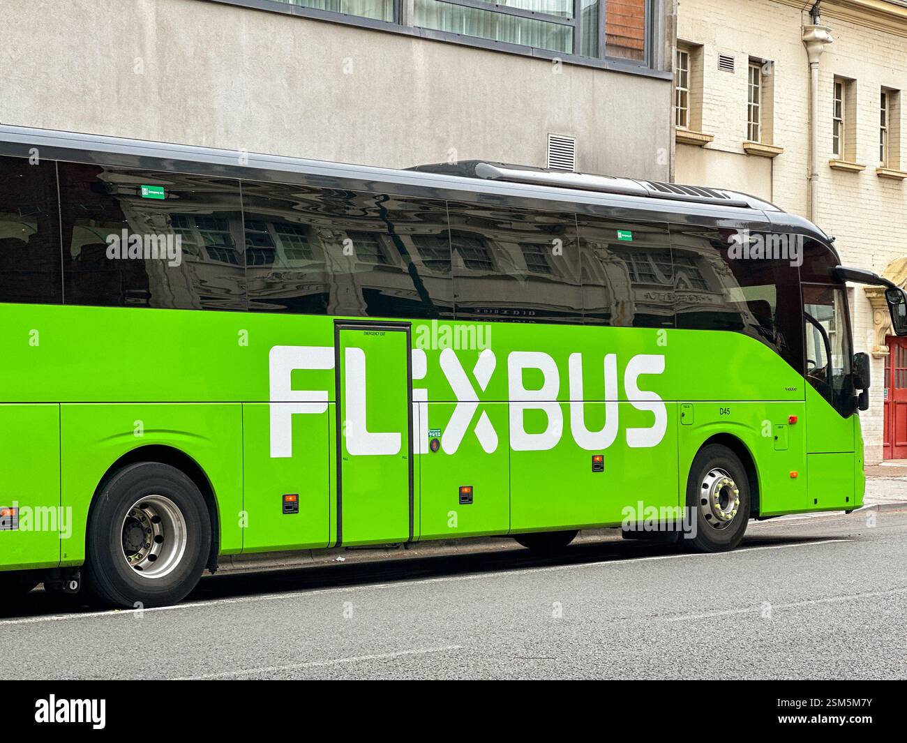 Cardiff, Wales - 24 July 2024: Express coach operated by Flixbus parked on a street in Cardiff city centre - Smartphone Captured Stock Image