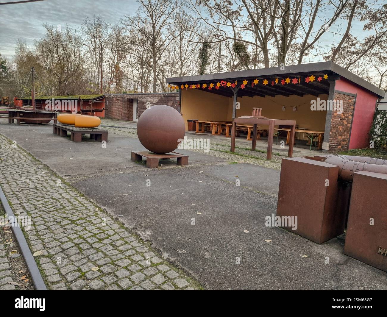 Steel modern artworks in Nature Park Schöneberger Südgelände on the former Tempelhof railway yard in Berlin, Germany, by ODIOUS - Smartphone Captured Stock Image