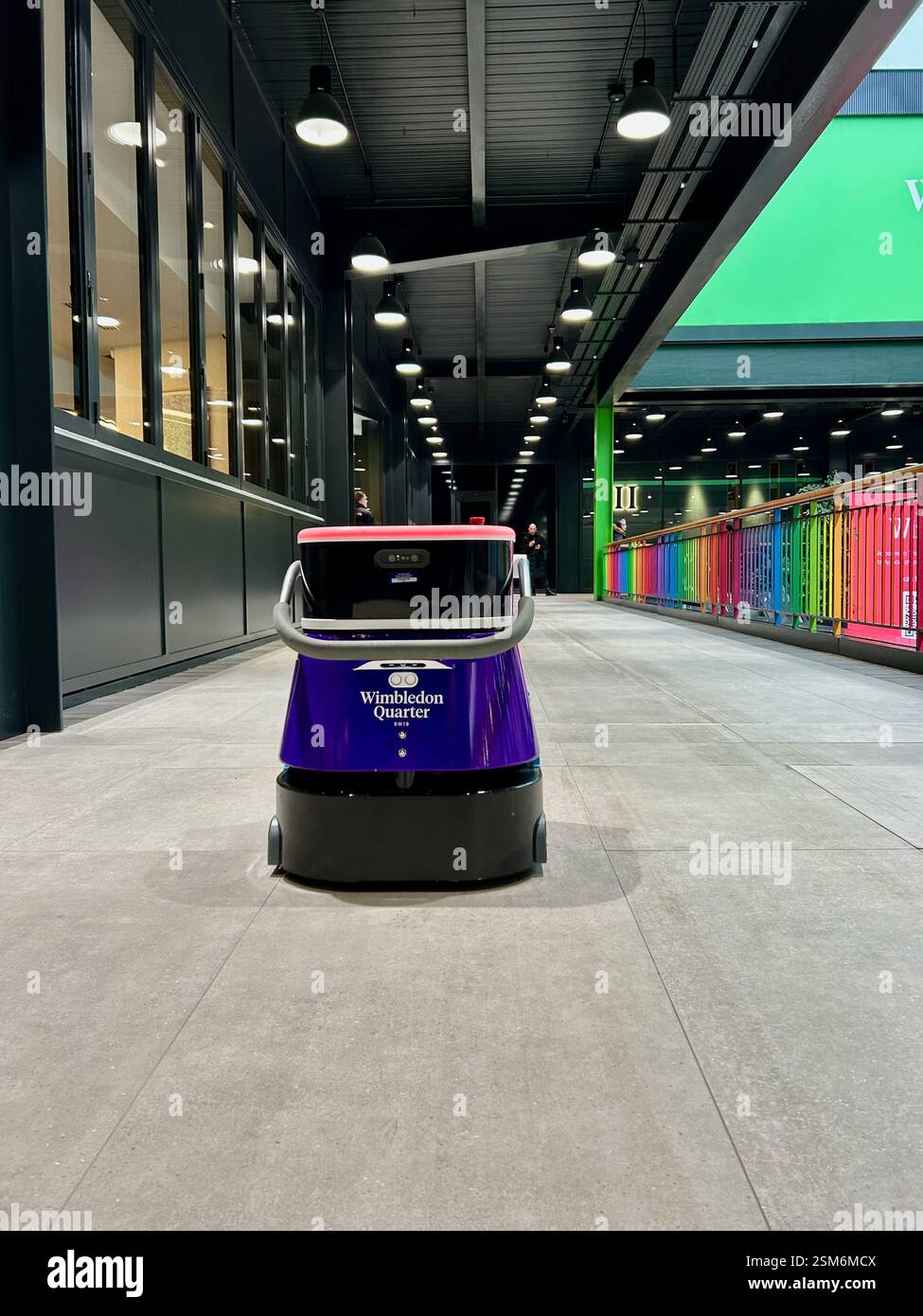 Robot floor cleaner operating at Wimbledon Quarter (formerly Centre Court) mall in London - Smartphone Captured Stock Image