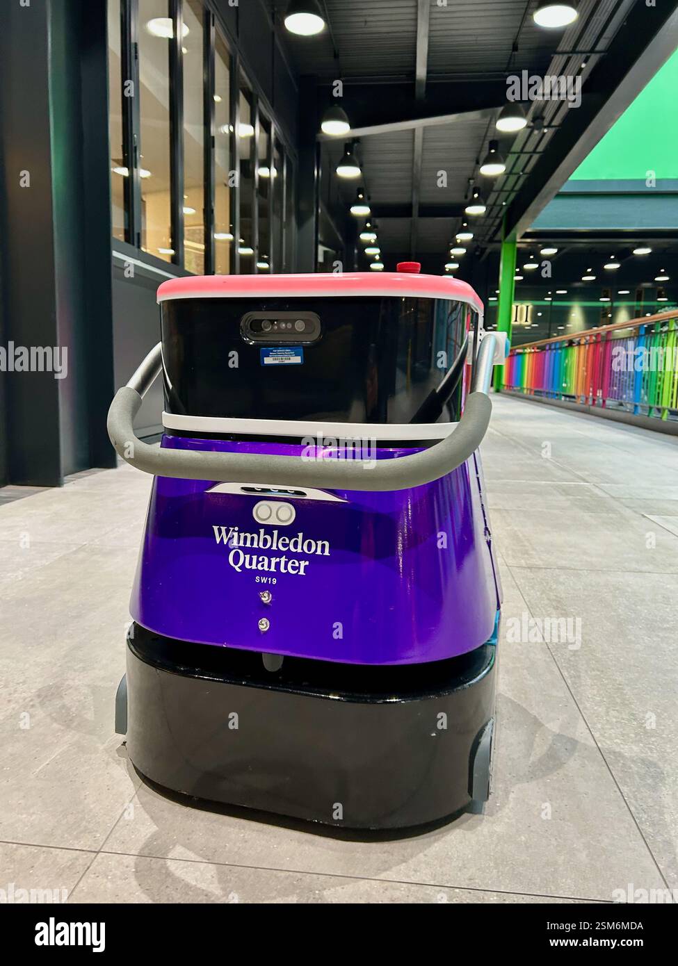 Robot floor cleaner operating at Wimbledon Quarter (formerly Centre Court) mall in London - Smartphone Captured Stock Image