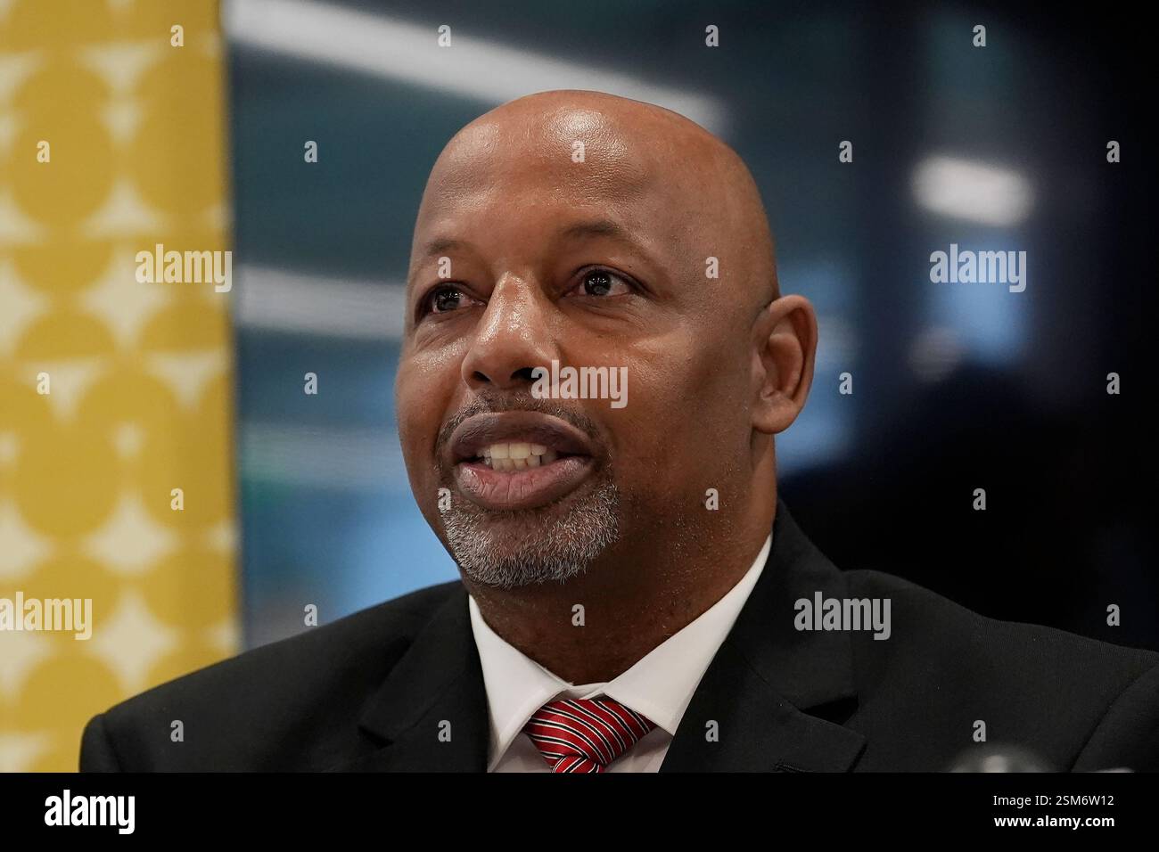 Former San Francisco 49ers defensive lineman Dana Stubblefield speaks at a news conference in