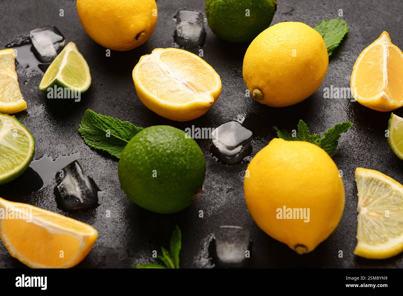 Ingredients for preparing lemonade on black background Stock Photo