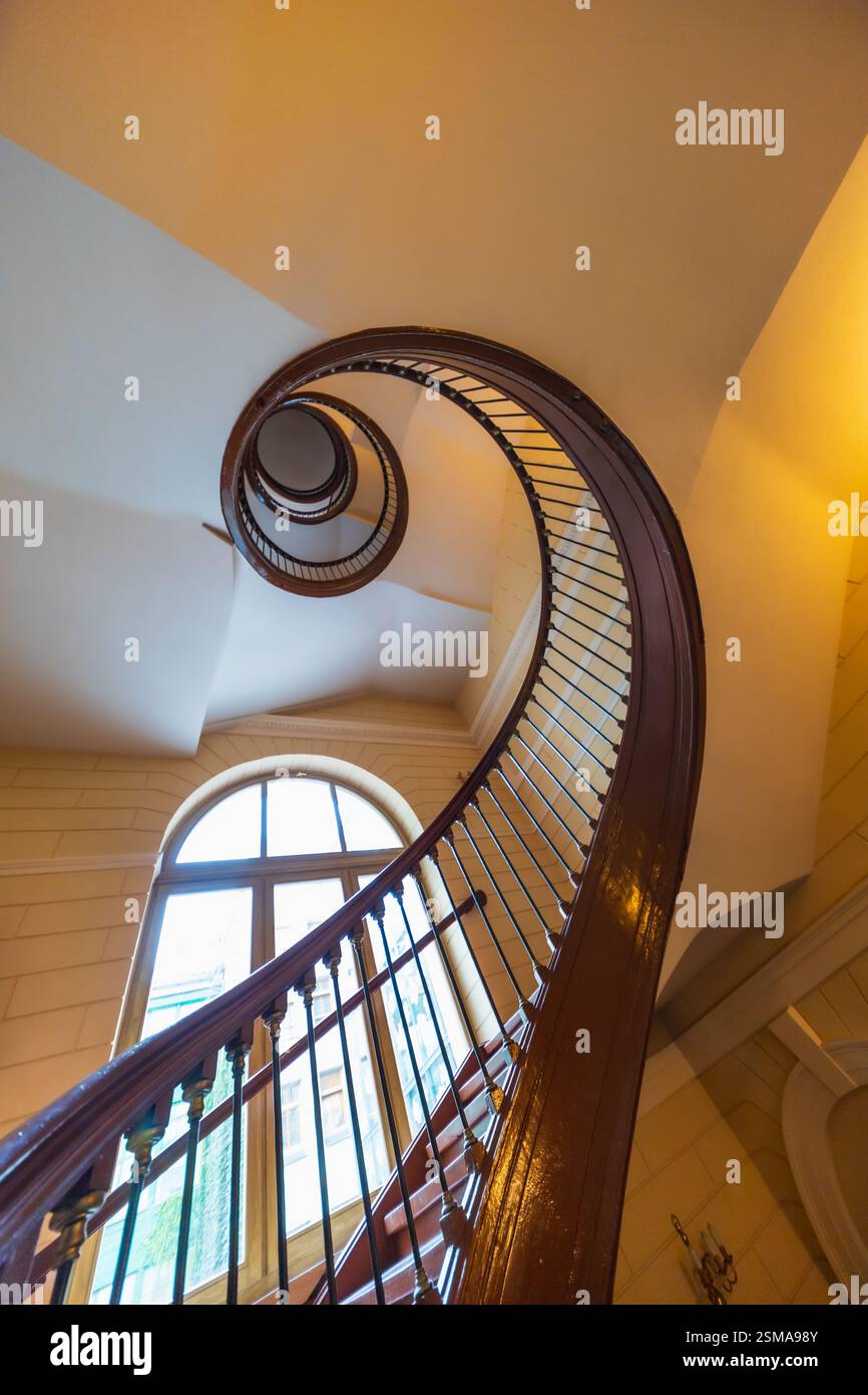 Wroclaw, Poland - July 3 2024: Elegant Wooden Spiral Staircase in ...