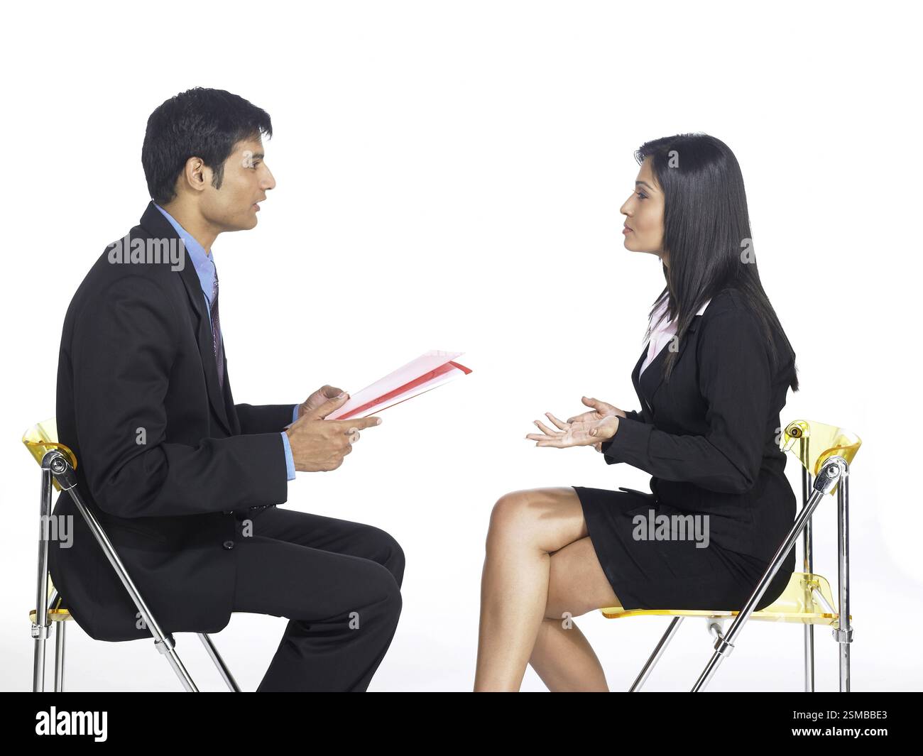South Asian Indian executive man taking interview of woman MR Stock ...