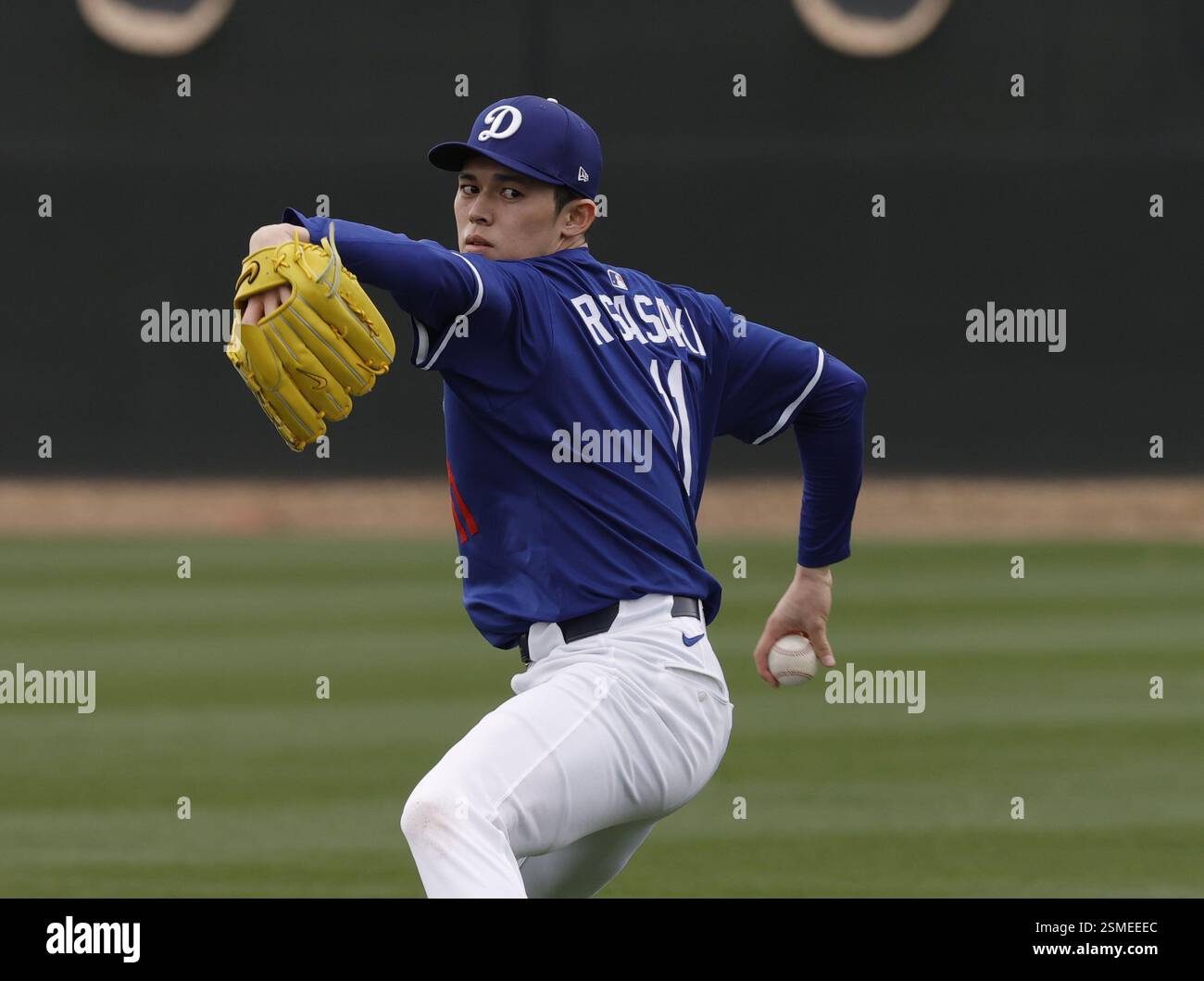 Los Angeles Dodgers rookie pitcher Roki Sasaki, wearing his No. 11 ...