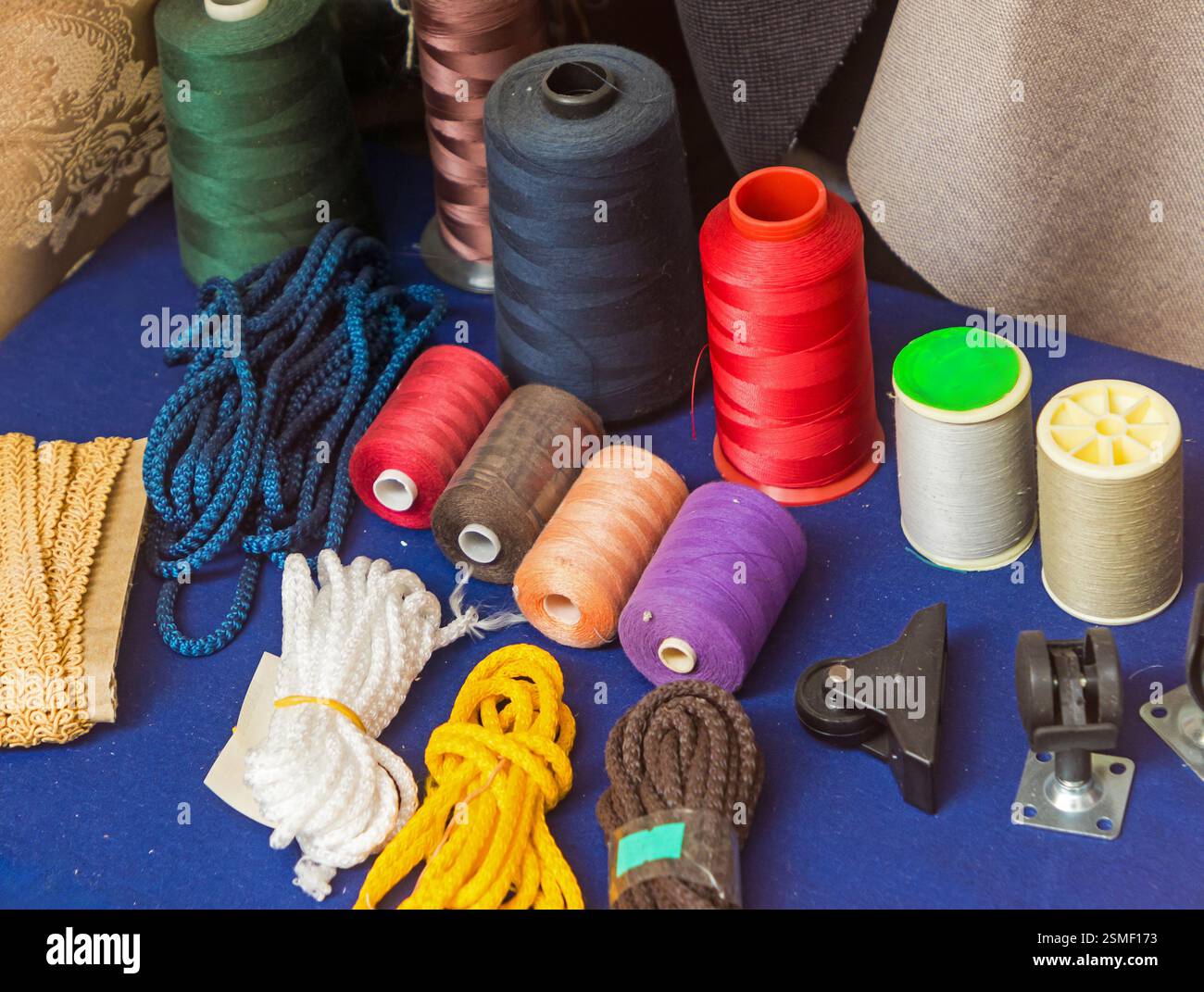 Tailoring accessories tools sewing materials with colorful threads Stock Photo