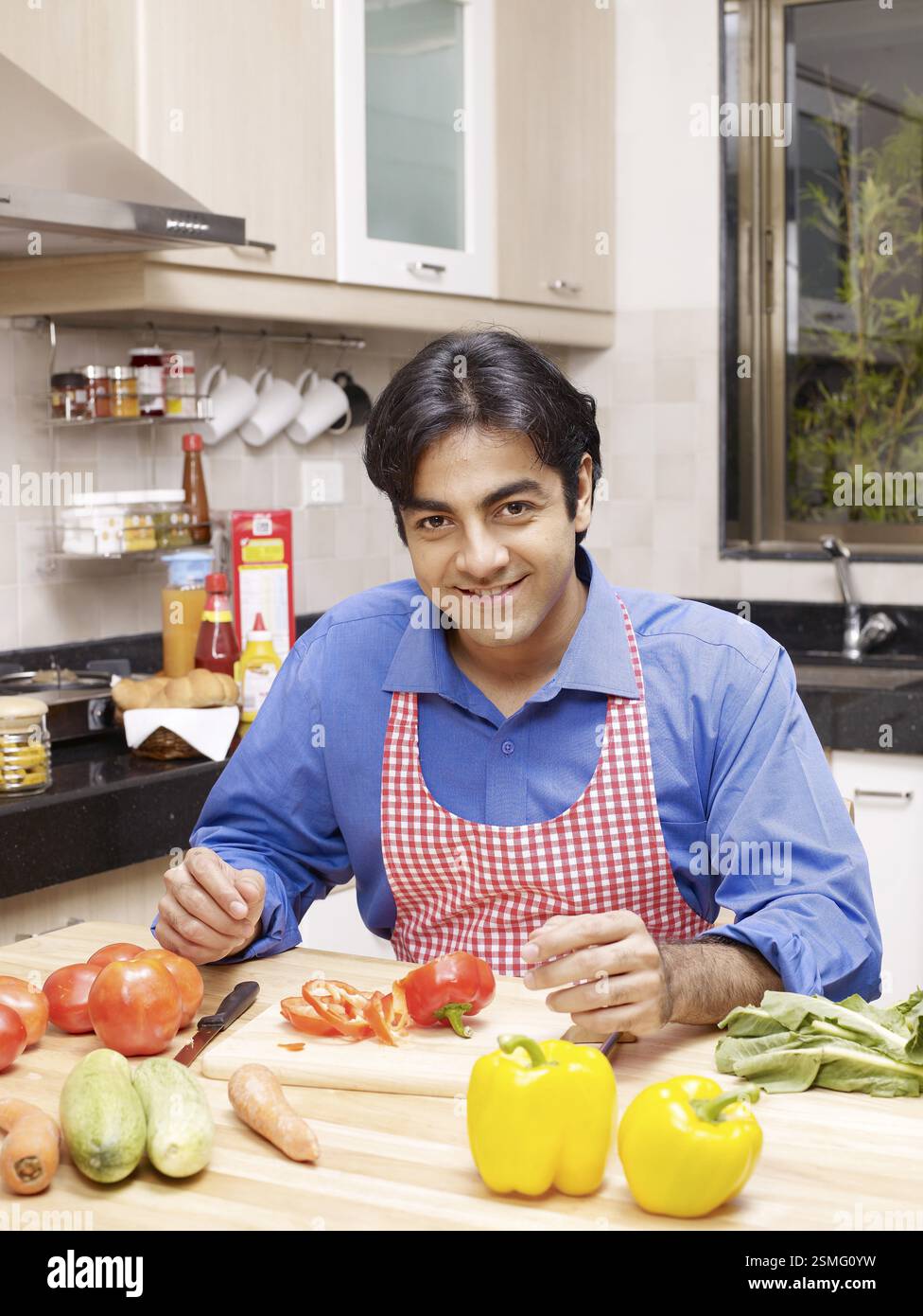 Person Using Kitchen Two people sitting kitchen hi-res stock photography and images - Alamy