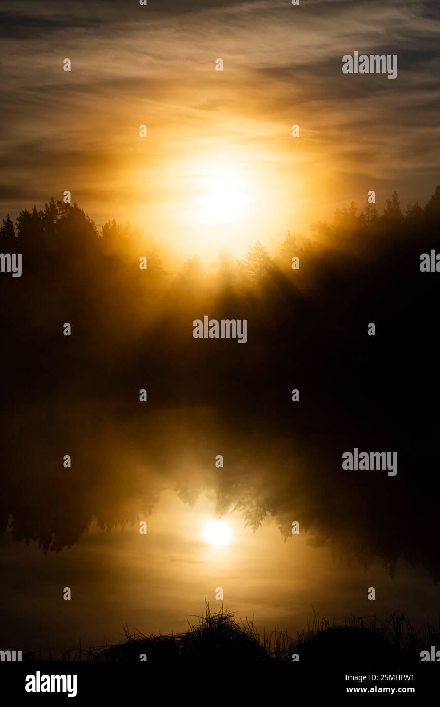 Sunrise at a wilderness pond in Raasepori, southwestern Finland Stock Photo