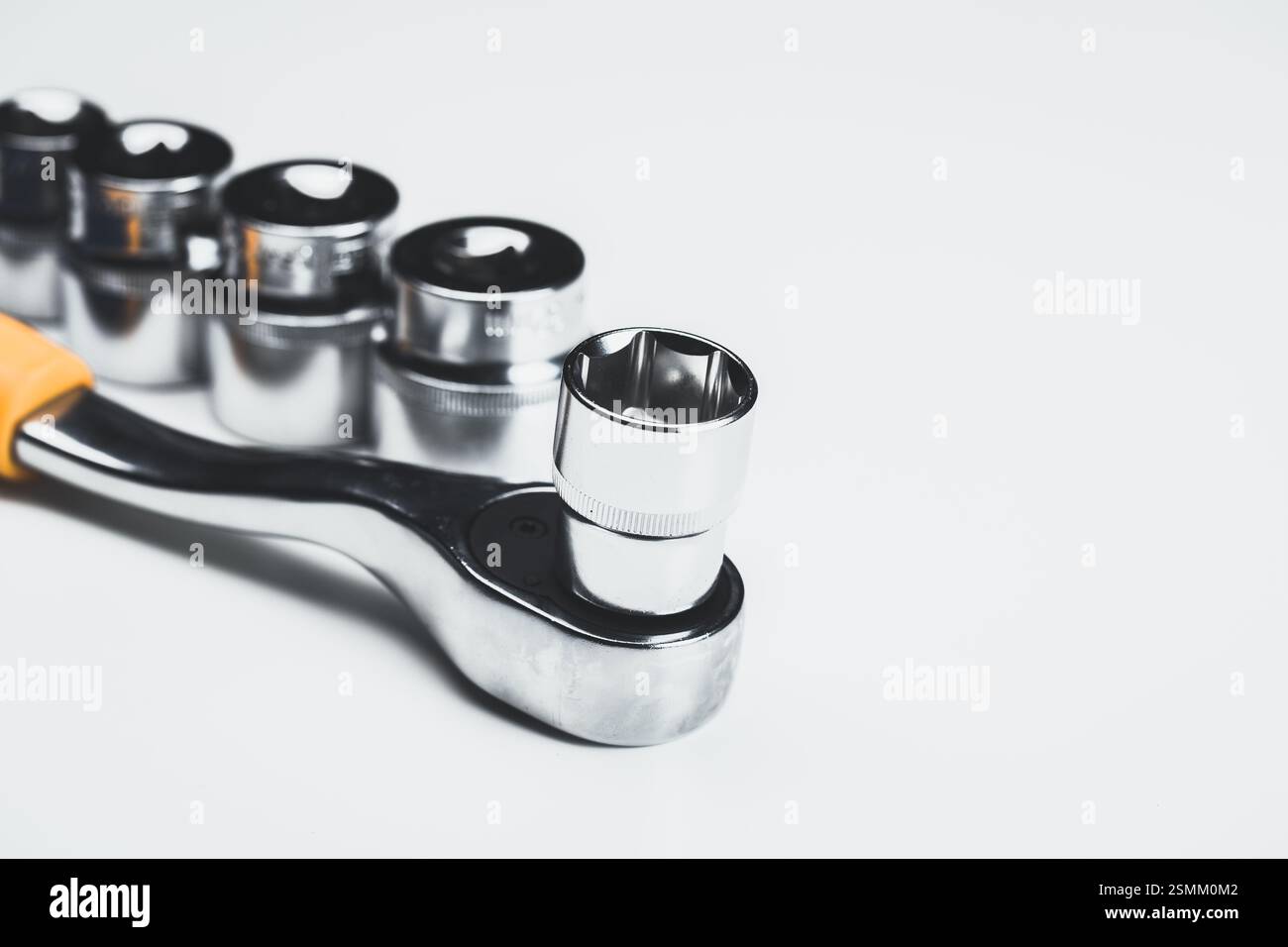 Precision tool set displayed with a socket wrench and sockets on a ...