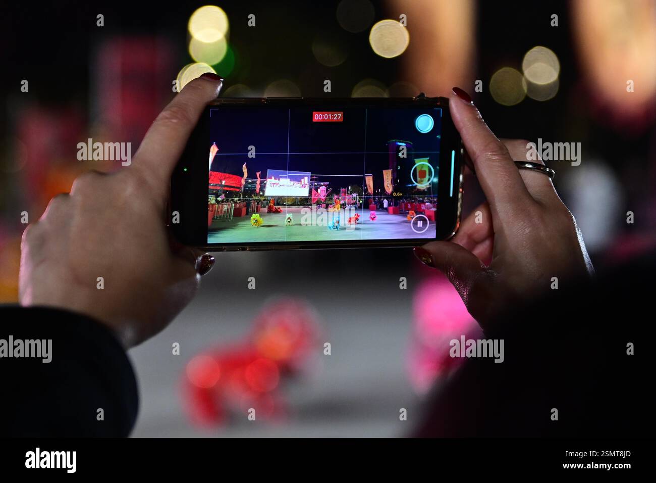 Robot dogs, with lion head-shaped decorations, perform dance alongside ...