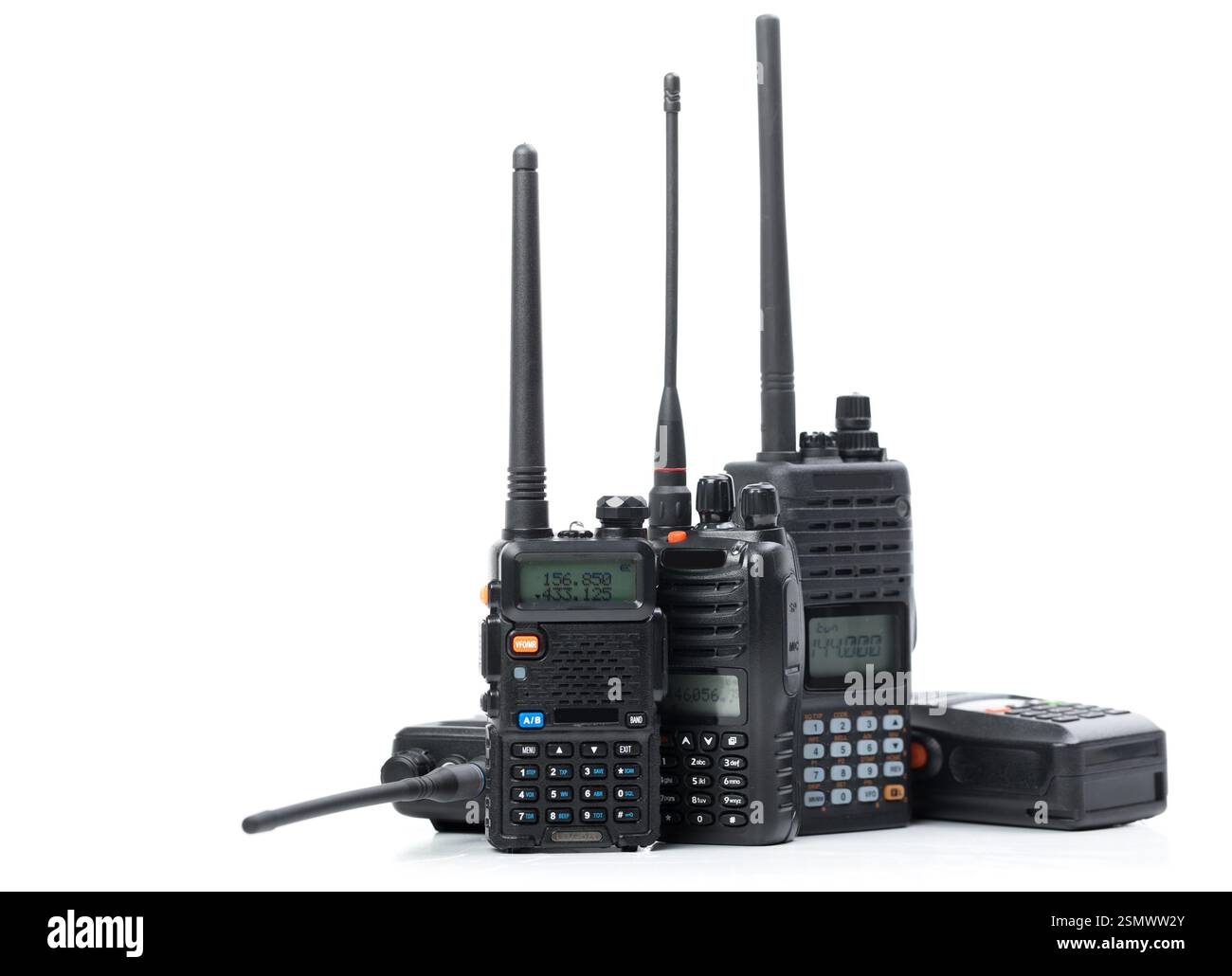 Variety of handheld radio communication devices arranged on a white ...