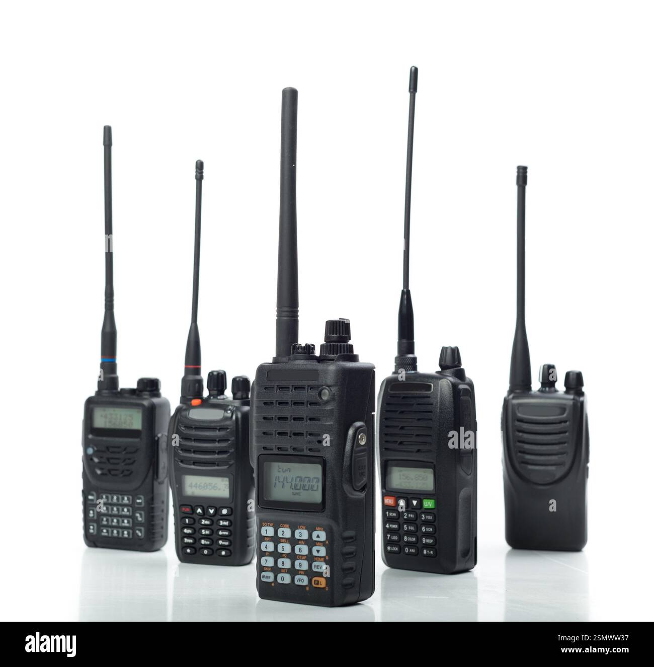 Various models of handheld radios on display with different antenna ...