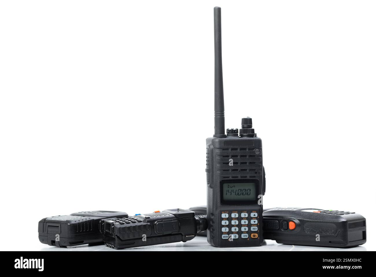 Collection of handheld radios displayed on a white background for ...