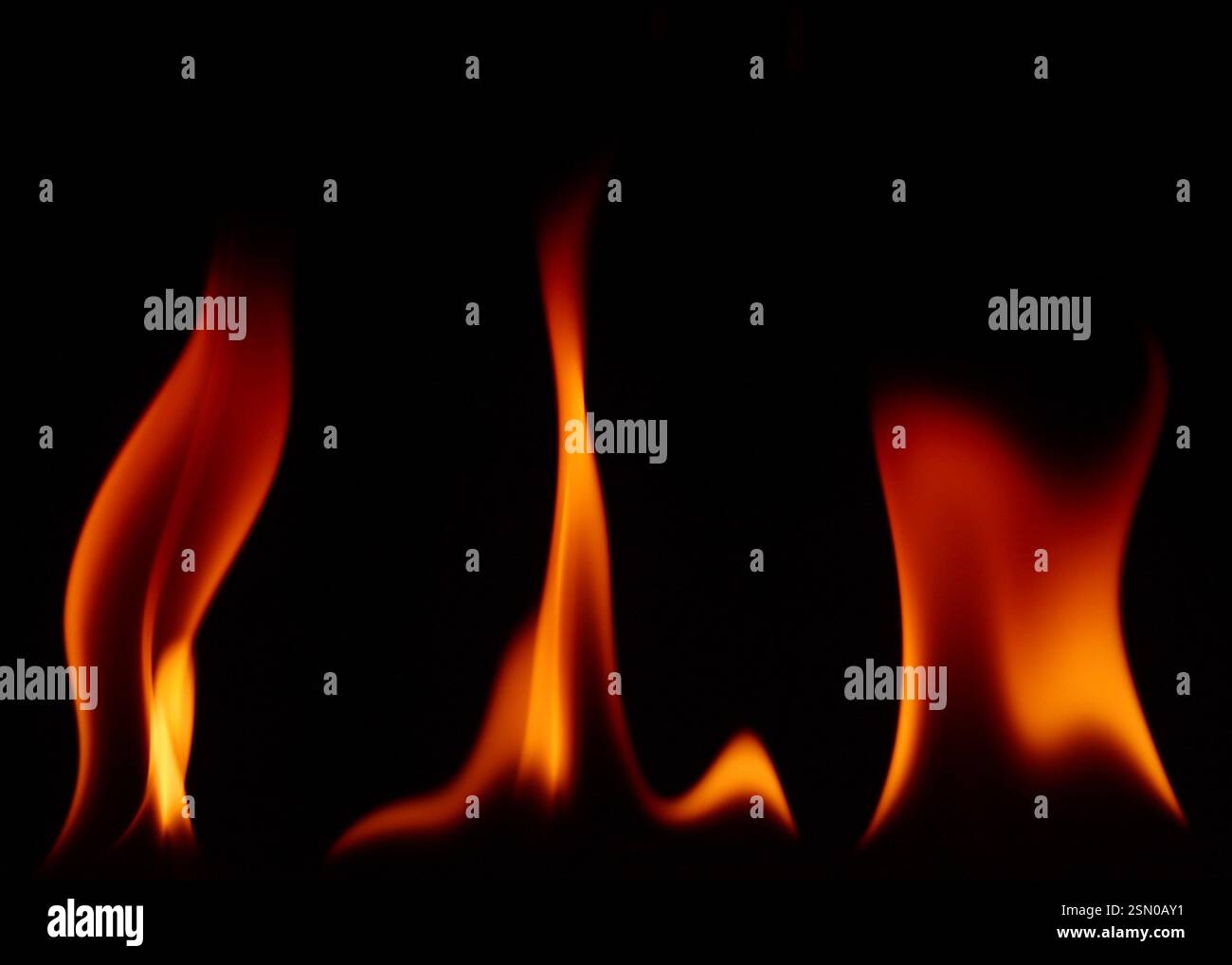 Vivid flames dancing in dark hi-res stock photography and images - Alamy