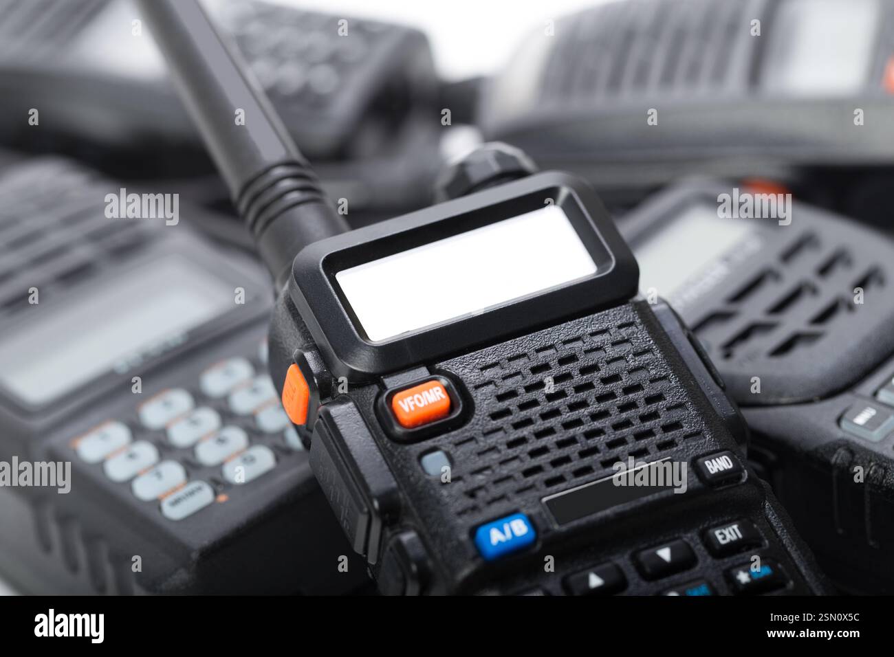 Communication devices stack highlighting handheld radios used for ...