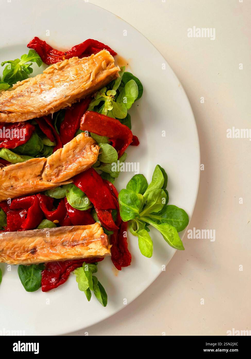 Mackerel loins with red peppers and water cress. - Smartphone Captured Stock Image
