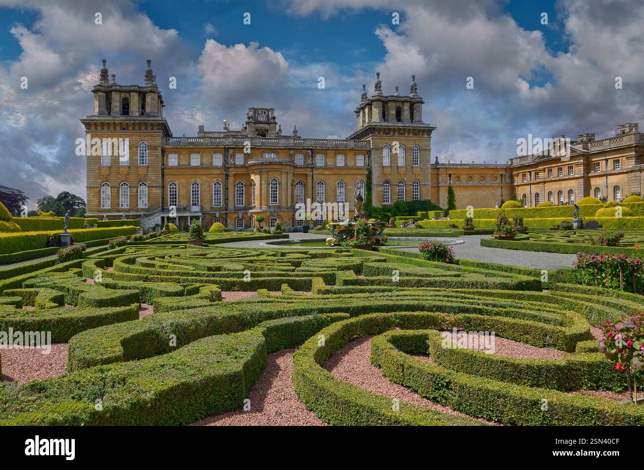 Photo of Blemheim Palace formal Italian Garden with formal topiary hedges, statues & fountain, Blenheim Palace, Oxfordshire England UK Stock Photo