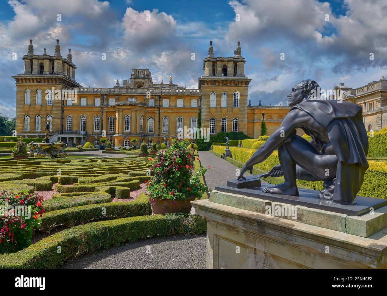 Photo of Blemheim Palace formal Italian Garden with formal topiary hedges, statues & fountain, Blenheim Palace, Oxfordshire England UK Stock Photo