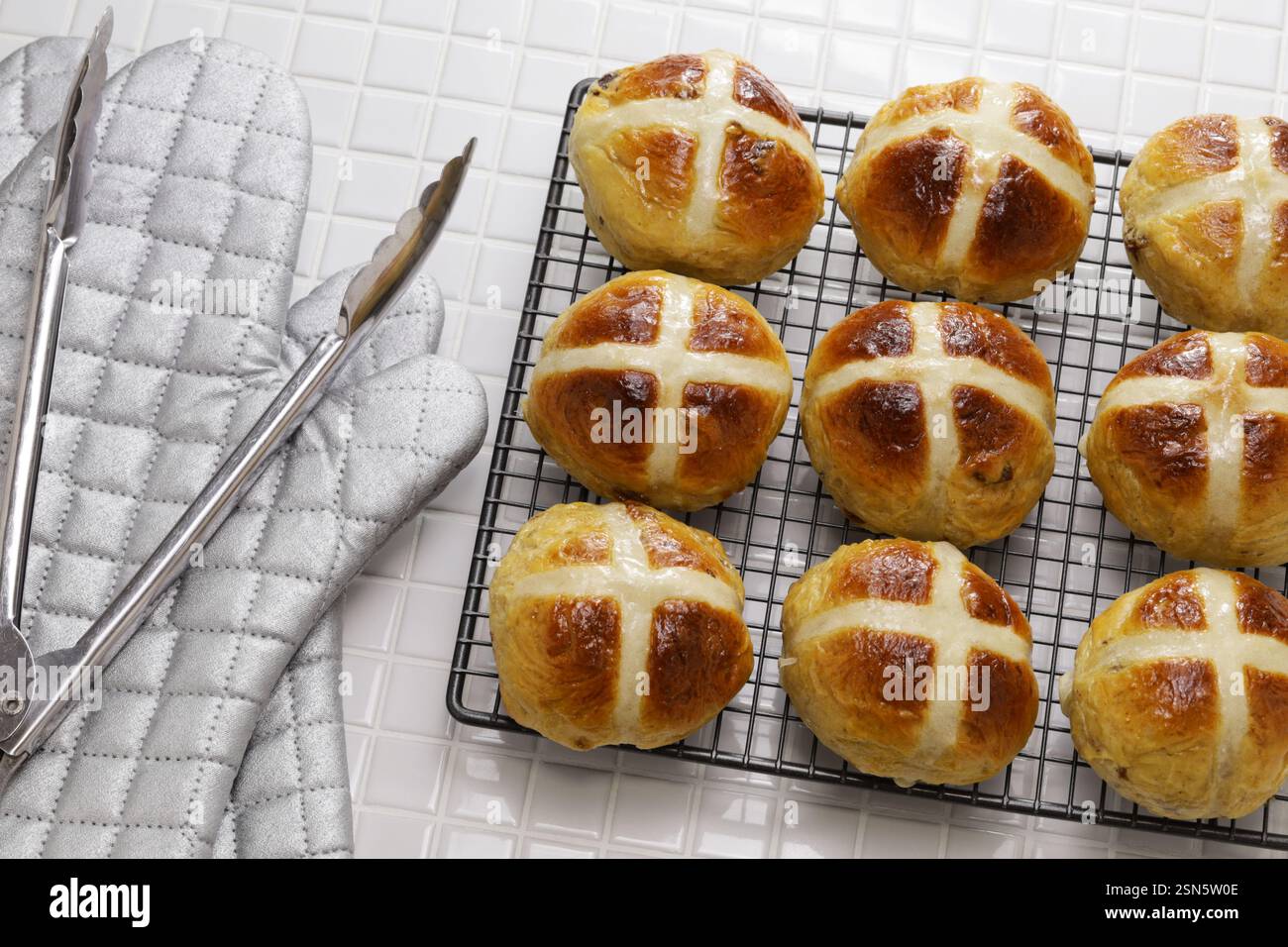 Homemade hot cross buns, a bread commonly eaten in Britain during Easter. Stock Photo
