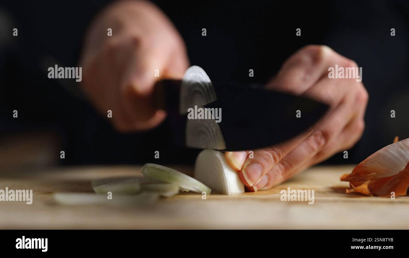 Woman cuts onion half rings hi-res stock photography and images - Alamy