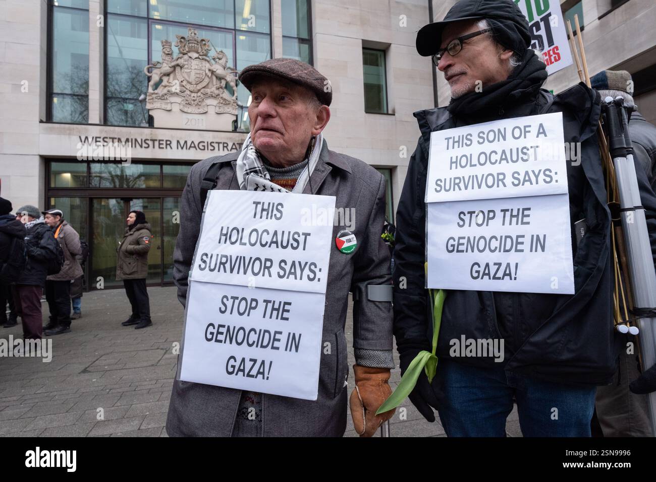 London, UK. 13 February, 2025. Stephen Kapos, (left) an 87-year-old Holocaust survivor from Budapest joins supporters of Chris Nineham gathered outside Westminster Magistrates Court as Mr Nineham appears on public order charges, which he denies, following his arrest at a Palestine Solidarity Rally on 18th January. A co-founder of the Stop The War Coalition and chief steward on the day of the protest Mr Nineham, supported by over fifty cross-bench MPs and Lords, is calling for an independent investigation into policing of the protest. Credit: Ron Fassbender/Alamy Live News Stock Photo