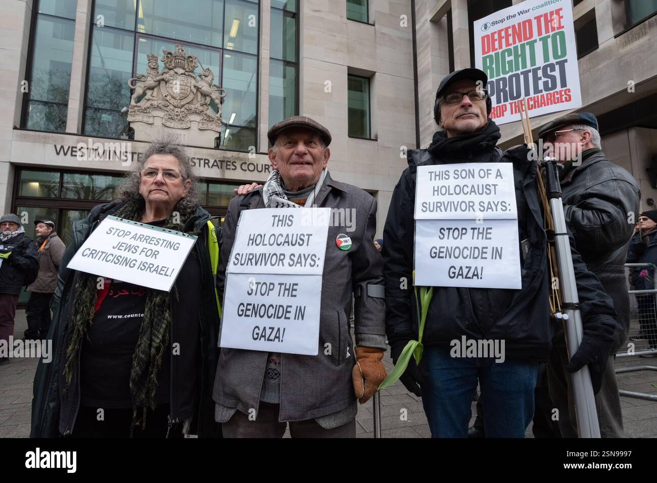 London, UK. 13 February, 2025. Stephen Kapos, (centre) an 87-year-old Holocaust survivor from Budapest joins supporters of Chris Nineham gathered outside Westminster Magistrates Court as Mr Nineham appears on public order charges, which he denies, following his arrest at a Palestine Solidarity Rally on 18th January. A co-founder of the Stop The War Coalition and chief steward on the day of the protest Mr Nineham, supported by over fifty cross-bench MPs and Lords, is calling for an independent investigation into policing of the protest. Credit: Ron Fassbender/Alamy Live News Stock Photo