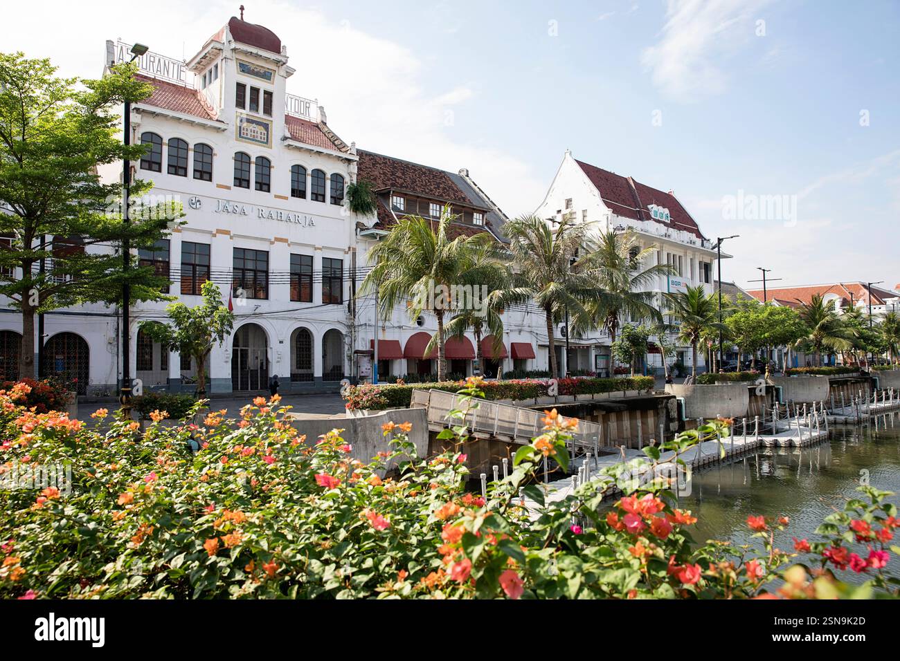 Old dutch colonial building in the old town of Jakarta across the river ...