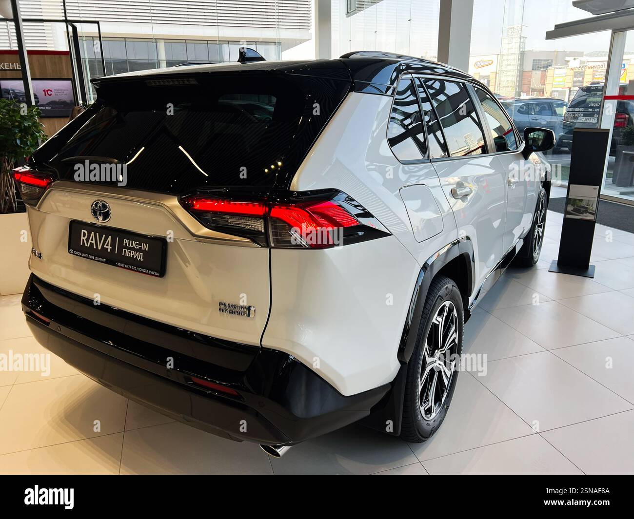 Lviv, Ukraine - February 12, 2025: Toyota RAV4 plugin hybrid showcased ...
