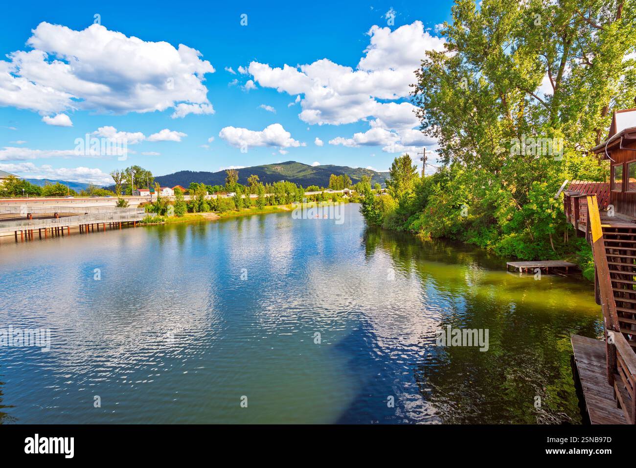 Waterfront buildings with shops and cafes along the Sand Creek River in Sandpoint, Idaho