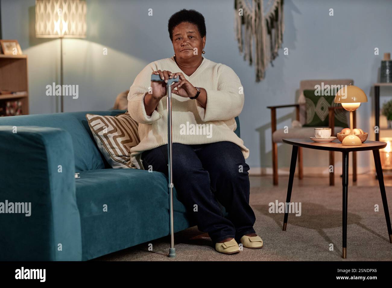 Elderly black woman walking hi-res stock photography and images - Alamy