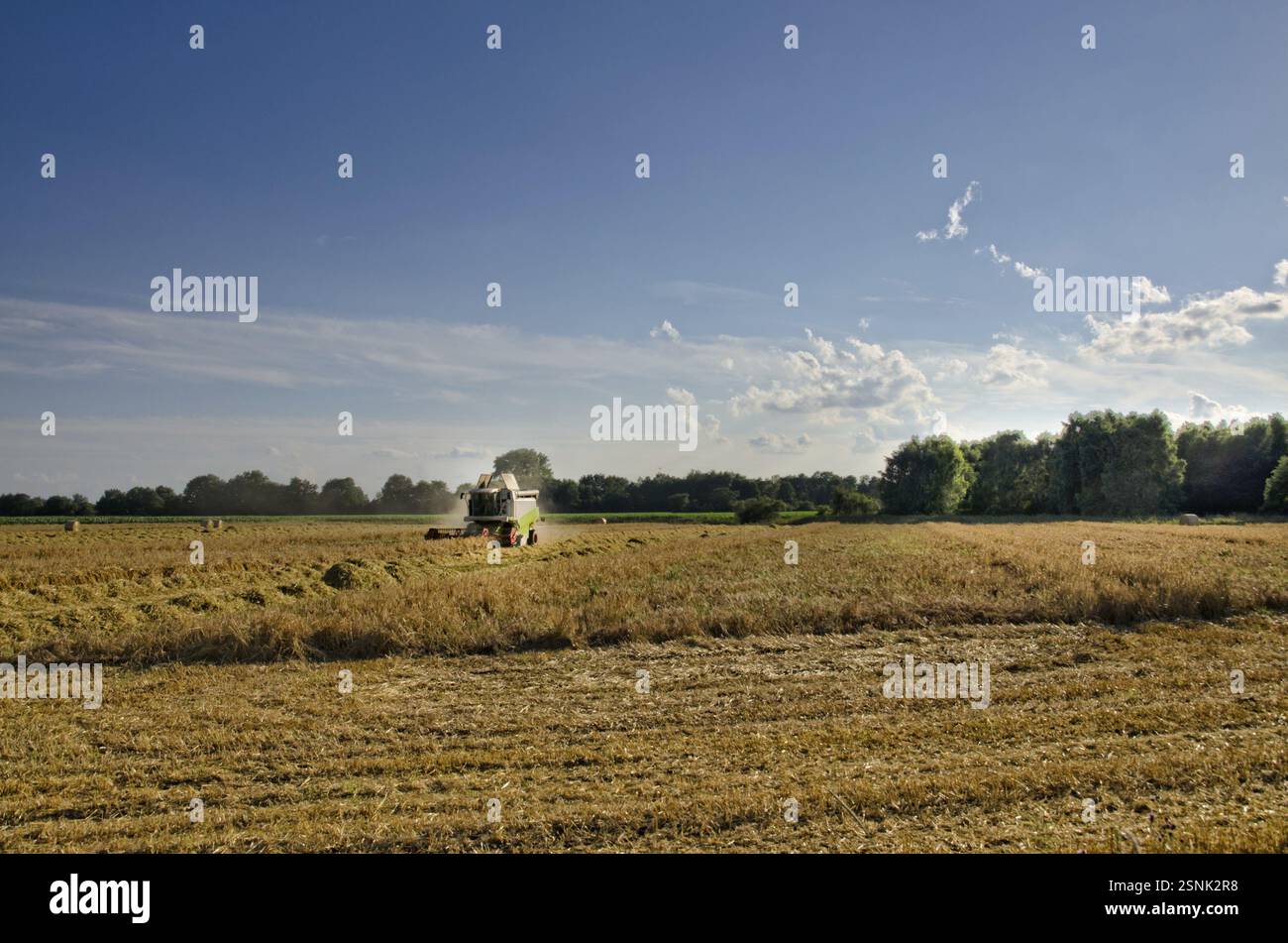 Tractors and harvesting Stock Photo - Alamy