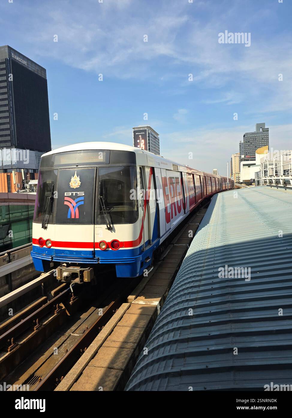 The BTS Skytrain approaching Siam station in Bangkok, Thailand. - Smartphone Captured Stock Image
