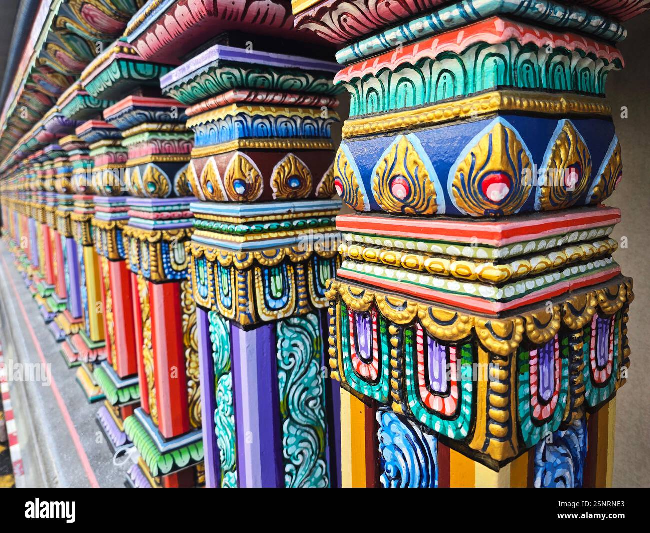 The colorful exterior wall of the Sri Maha Mariamman Temple in Bangkok, Thailand. - Smartphone Captured Stock Image