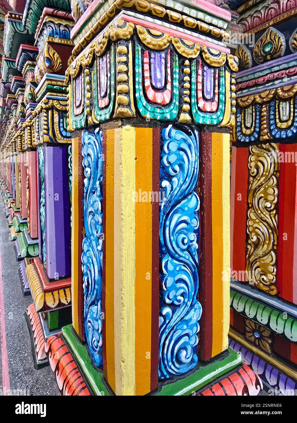 The colorful exterior wall of the Sri Maha Mariamman Temple in Bangkok, Thailand. - Smartphone Captured Stock Image