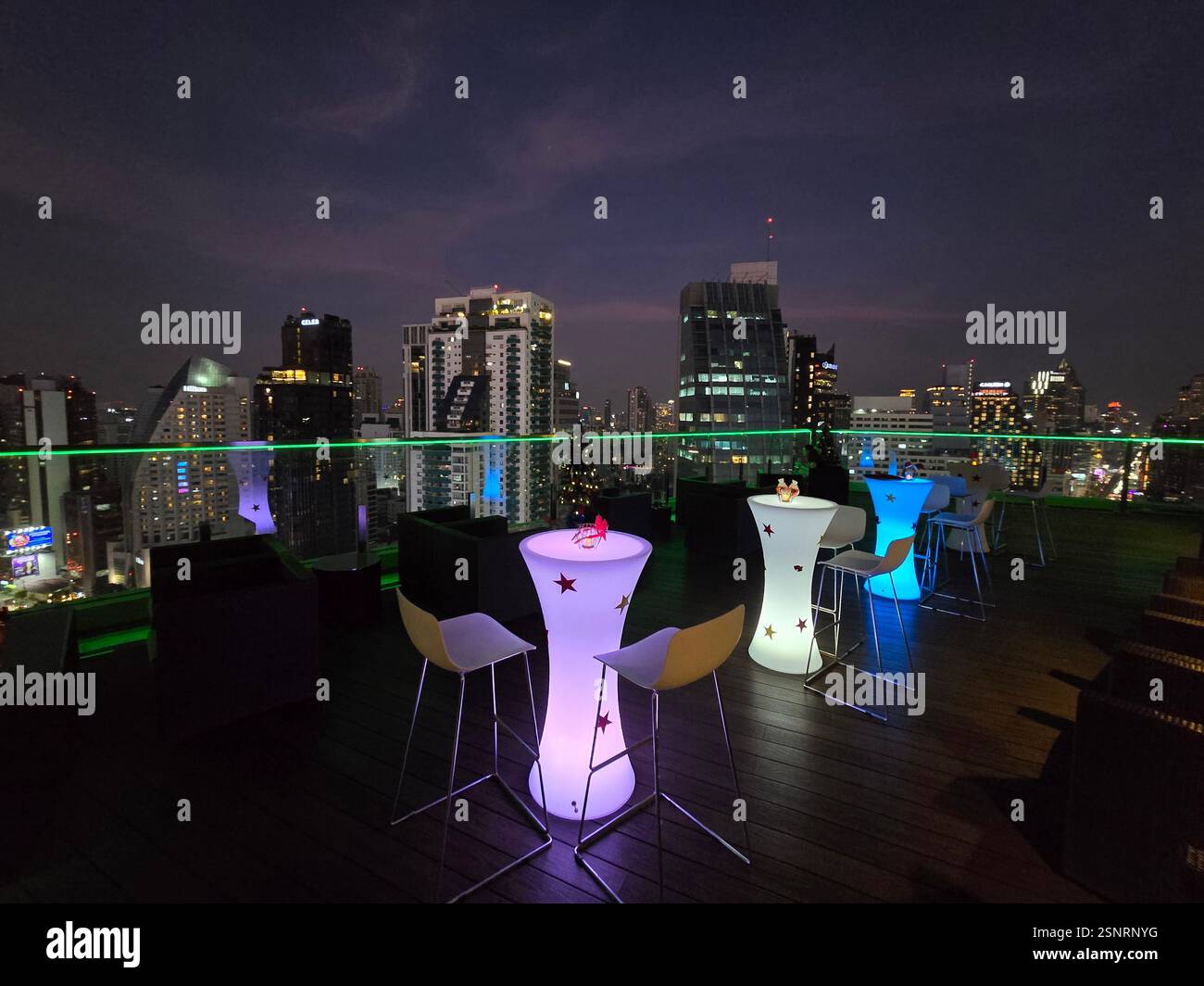 The beautiful rooftop bar at the Solaria Nishitetsu Hotel on Sukhumvit Road in Bangkok, Thailand. - Smartphone Captured Stock Image