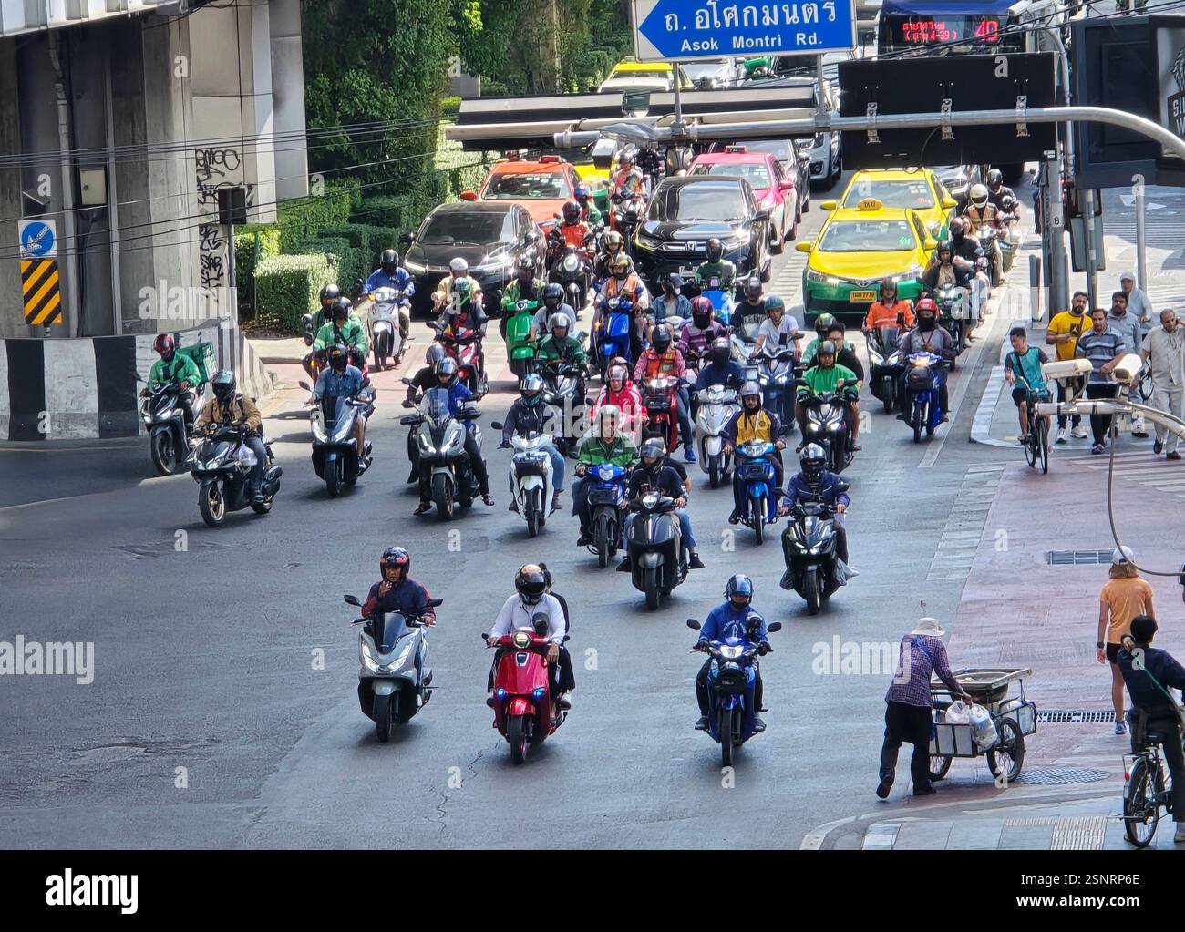 Traffic at Asok junction at night. Bangkok, Thailand. - Smartphone Captured Stock Image
