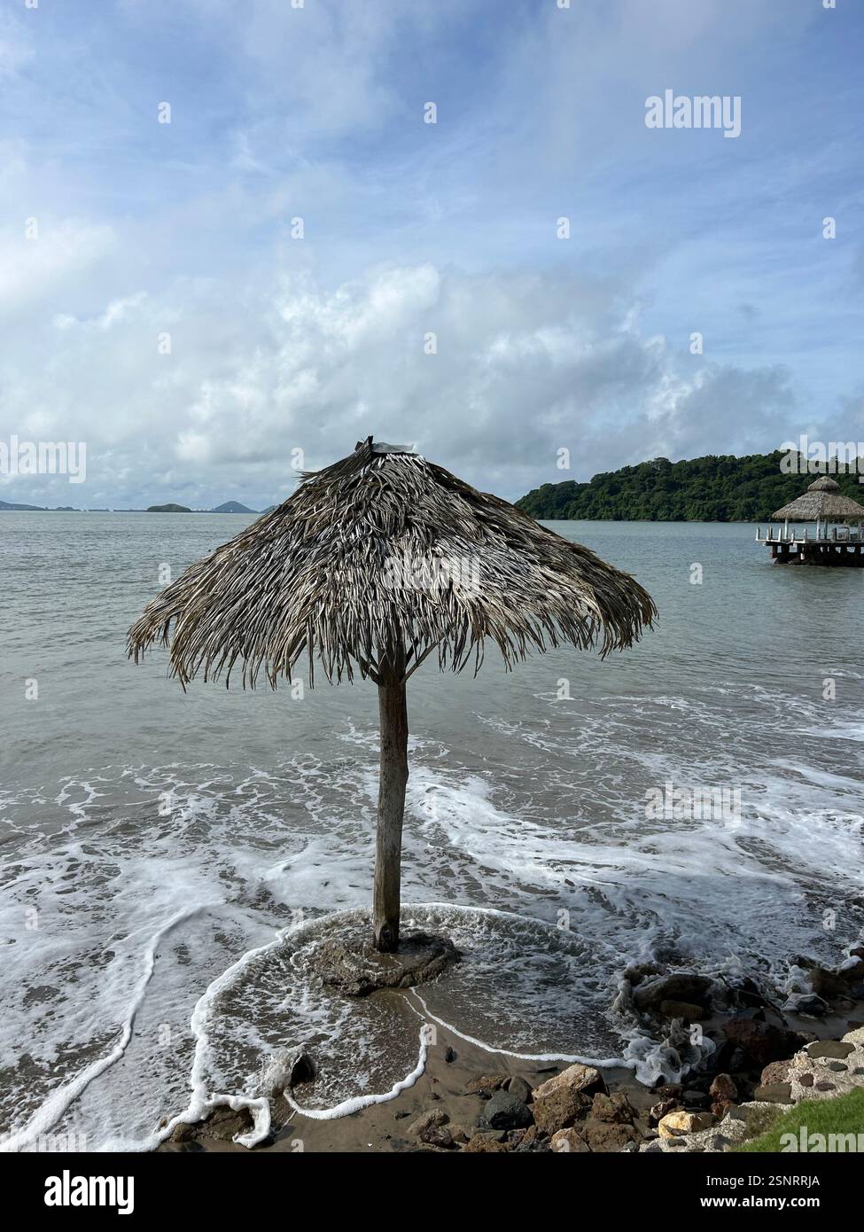Thatch Umbrella in the Ocean | Panama - Smartphone Captured Stock Image