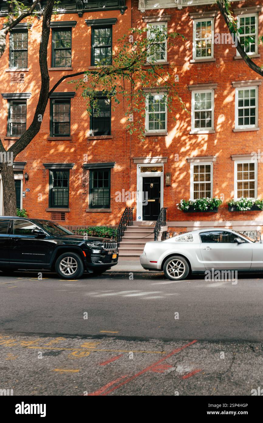 A charming street in New York City showcases historic brownstone ...