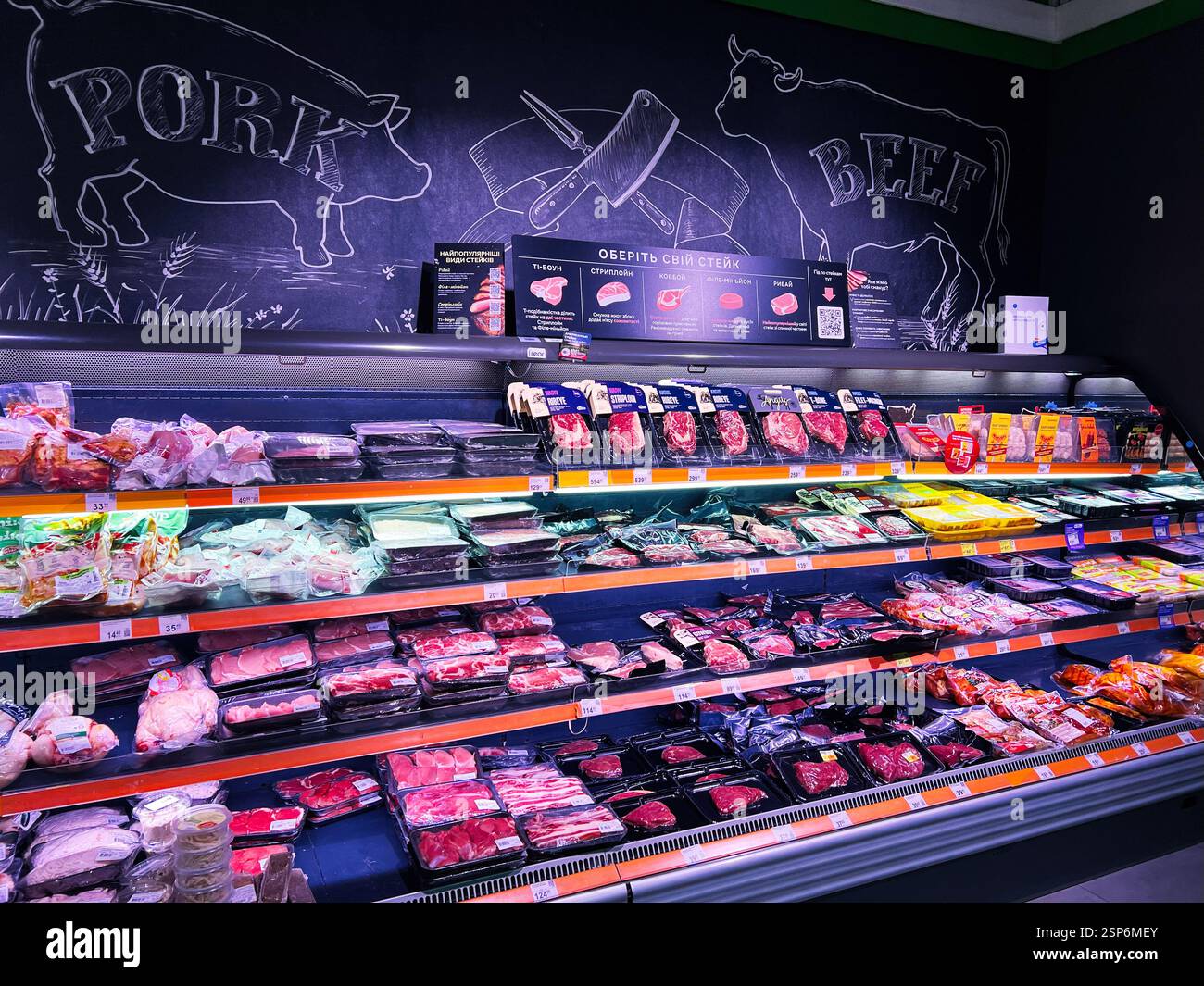 Lviv, Ukraine - February 13, 2025: Meat assortment on shelves in ...