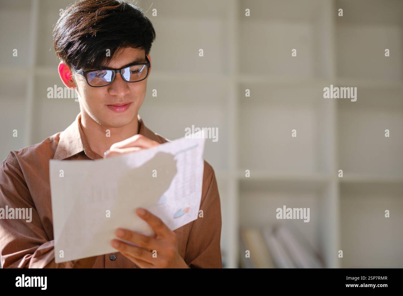 Young businessman analyzing financial data a Stock Photo