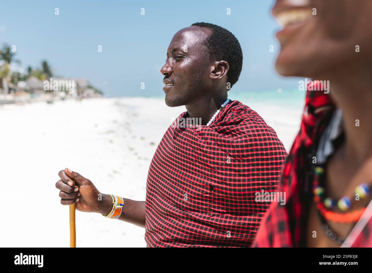 Ethnic masai males looking far away. Stock Photo