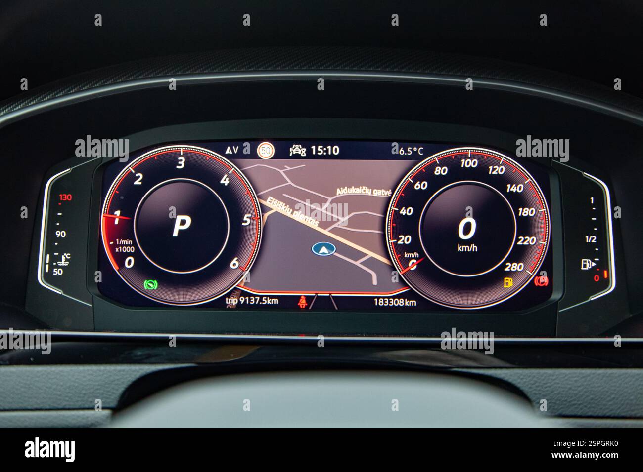 Dashboard screen with navigation on the car control panel, speedometer, fuel level and engine temperature level Stock Photo