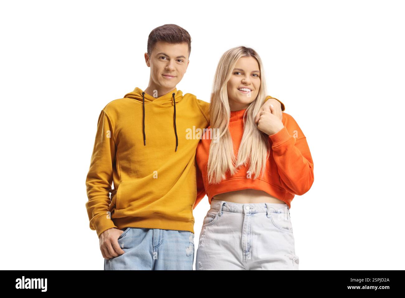 Young couple in embrace posing and smiling isolated on white background Stock Photo