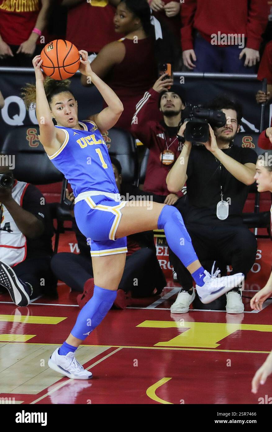 LOS ANGELES, CA - FEBRUARY 13 : UCLA Bruins guard Kiki Rice (1) grabs a ...