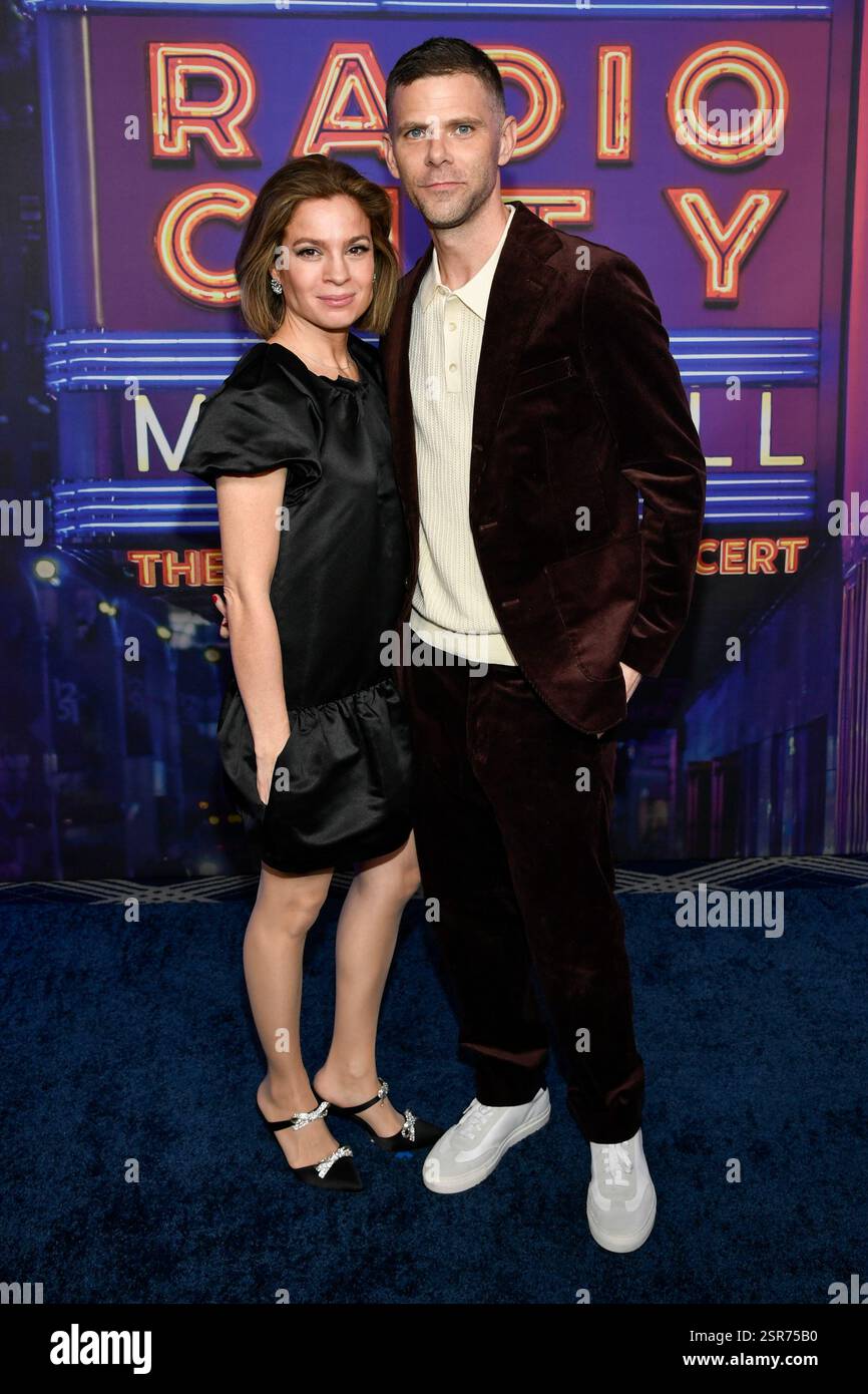 Paula Christensen, left, and Mikey Day attend the SNL50 The